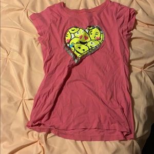 This is a t-shirt with cute emojis it’s $10